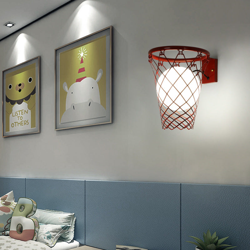 Modern Art Deco Kids Basketball Hoop Wall Sconce - 1-Light Glass Lamp  

Illuminate your child’s bedroom with this stylish Modern Art Deco kids basketball hoop wall sconce. Featuring a sleek glass design and a playful basketball motif, this 1-light lamp a