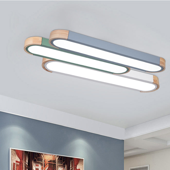 Contemporary Scandinavian Long Oval Iron Log Acrylic LED Flush Mount Ceiling Light for Bedroom