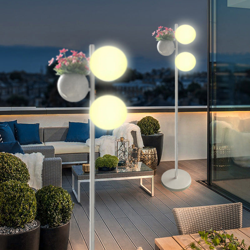 Contemporary Outdoor LED Globe Shade Floor Lamp for Patio Decor - Waterproof and Stylish Flowerpot Design