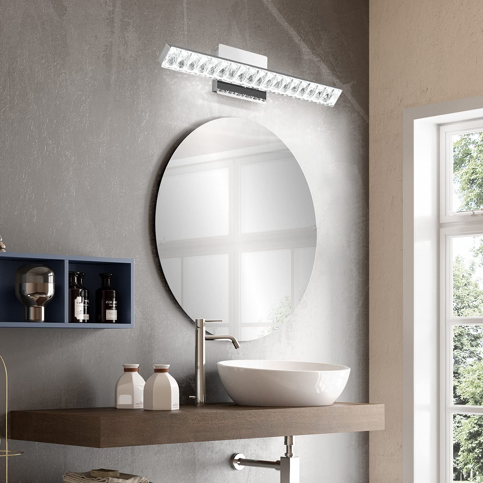 Modern Luxury Stainless Steel Crystal LED Wall Sconce Vanity Light  

Transform your bathroom with this elegant wall sconce featuring a sleek stainless steel design adorned with crystals. The rotatable feature allows for adjustable lighting, enhancing any