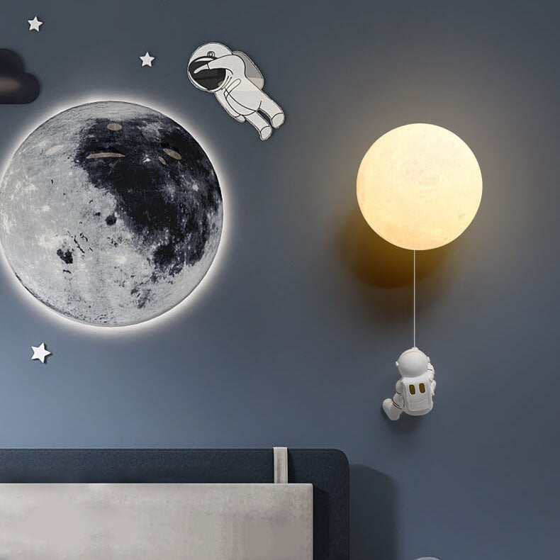 Contemporary Orb Astronaut Wall Sconce - Iron Resin 1-Light Lamp for Bedroom

Illuminate your space with the contemporary Orb Astronaut Wall Sconce, designed to bring a modern touch to your bedroom. This unique 1-light lamp features an elegant orb shape c