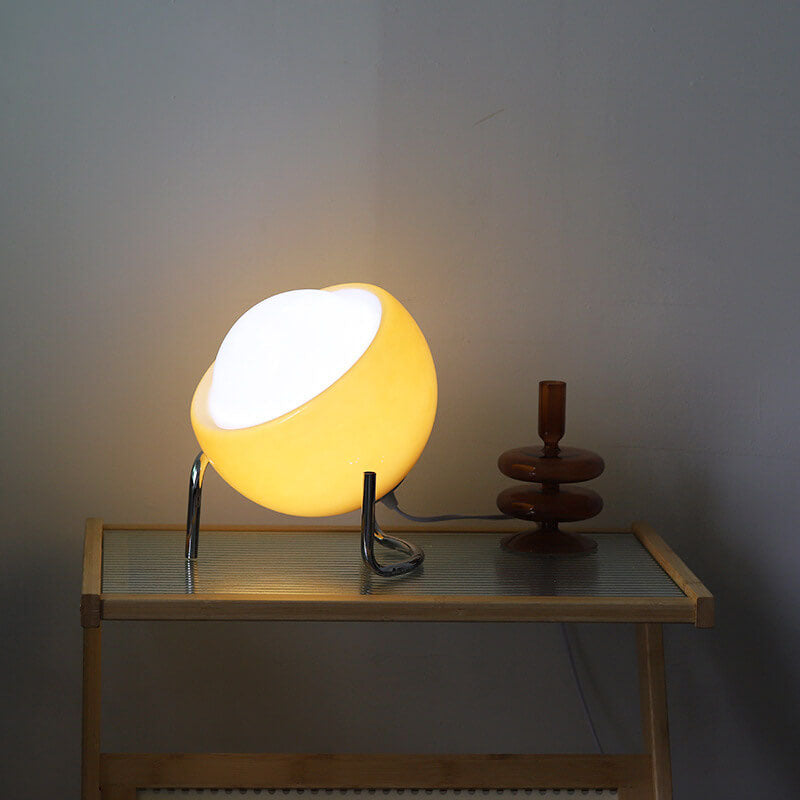 Contemporary Nordic Planet Orange Glass Iron 1-Light Table Lamp 

Enhance your bedroom decor with this modern Nordic-inspired table lamp. Featuring a striking orange glass shade and durable iron base, this 1-light lamp offers both style and functionality.