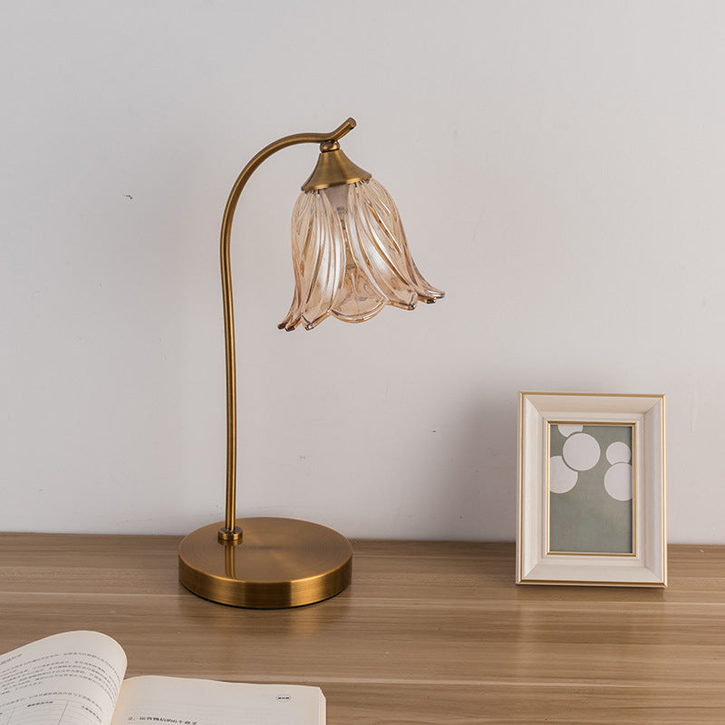 Modern Art Deco Round Flower Metal Glass Table Lamp - 1-Light for Bedroom

Enhance your bedroom decor with this stunning modern Art Deco table lamp. Featuring a round flower-shaped design, crafted from durable metal and glass, it offers both style and fun