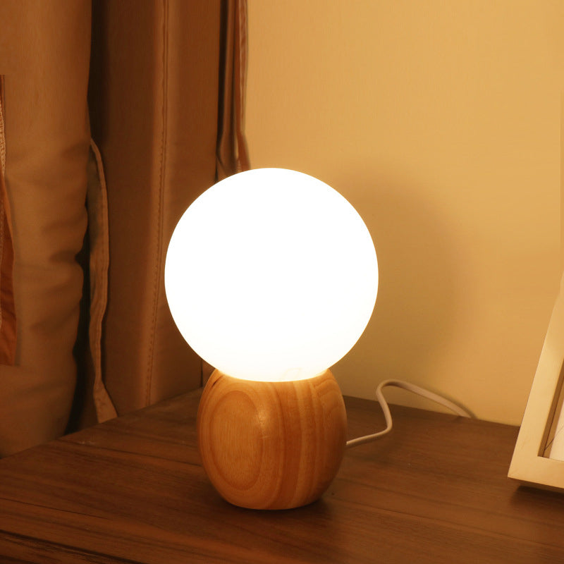 Contemporary Scandinavian Orb Glass Wood Base 1-Light Table Lamp for Bedroom Modern Minimalist Bedroom Lighting Decorative Accent Light Nordic Design Home Décor Stylish Bedside Lamp