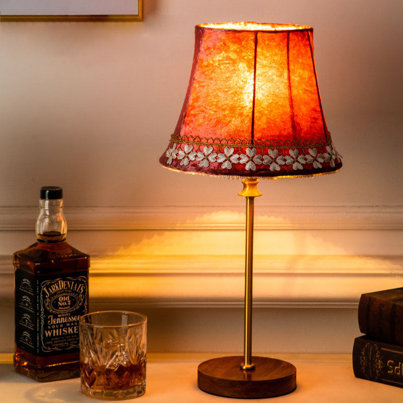 Traditional European Drum Velvet Copper Wood Table Lamp - 1-Light for Living Room

Elevate your living room decor with this stylish Traditional European Drum Table Lamp, featuring a luxurious velvet shade, elegant copper accents, and a sturdy wood base. P
