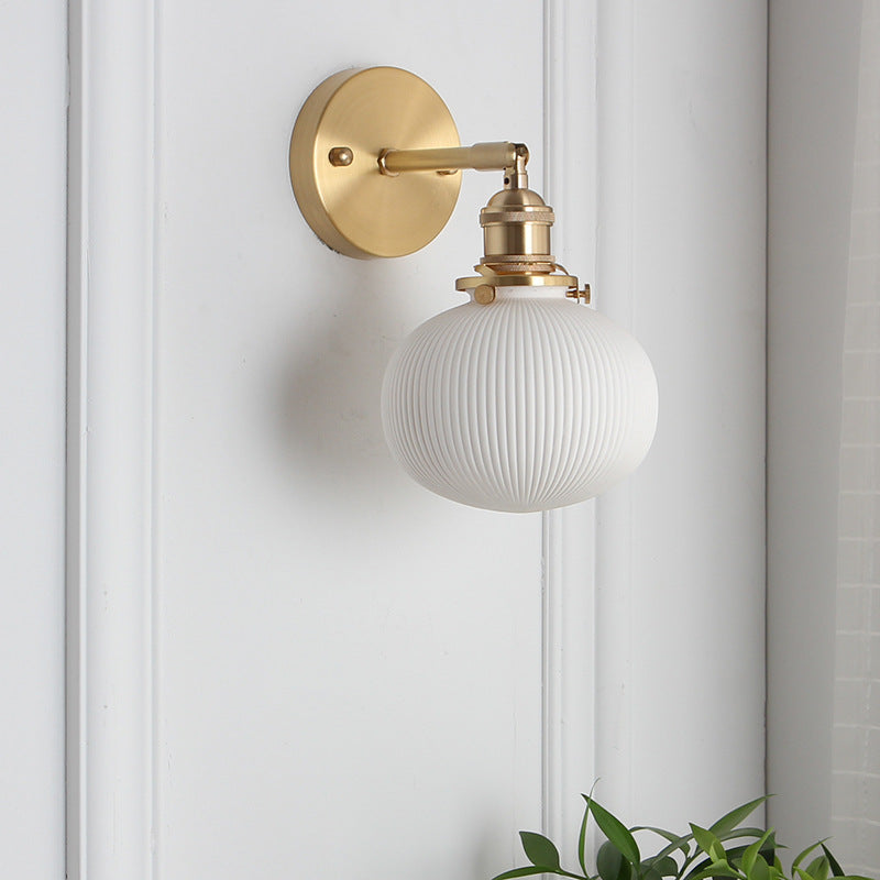 Japanese Retro Minimalist Brass Lucite Wall Sconce Lamp - 1-Light Oval Design