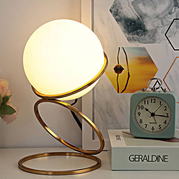 Modern Minimalist Spiral Circle Base Iron Glass Ball 1-Light Table Lamp for Living Room Bedroom Decorative Lighting Contemporary Home Decor Unique Design Stylish Nightstand Lamp Desk Lamp Warm Ambient Light for Modern Interior
