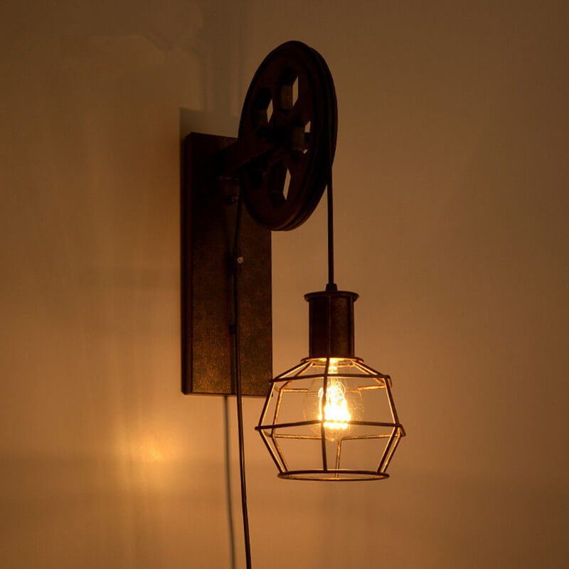 Vintage Industrial Iron Pulley Wall Sconce Lamp - 1-Light Fixture 

Elevate your home decor with this stylish vintage industrial pulley wall sconce. Crafted from durable iron, this 1-light lamp combines rustic charm with modern functionality. Perfect for