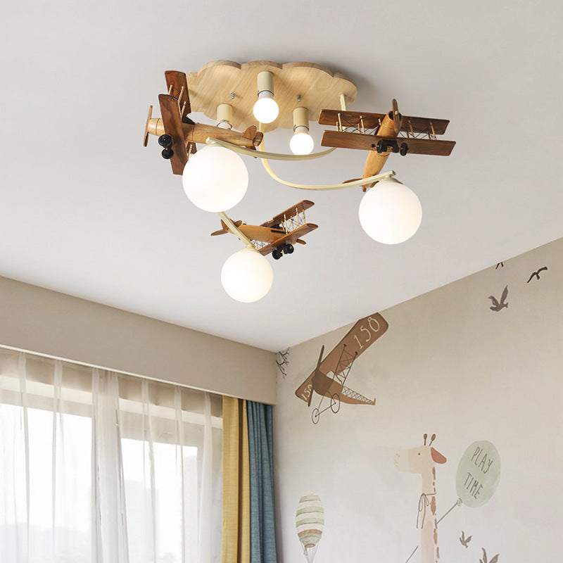 Contemporary Nordic Kids Iron Rubber Wood Glass Plane Cloud Ball 6-Light Flush Mount Ceiling Light for Bedroom, Modern Children's Lighting Fixture, Stylish Nursery Decor, Unique Playroom Illumination, Scandinavian Style Ceiling Lamp, Kid-Friendly Room Lig