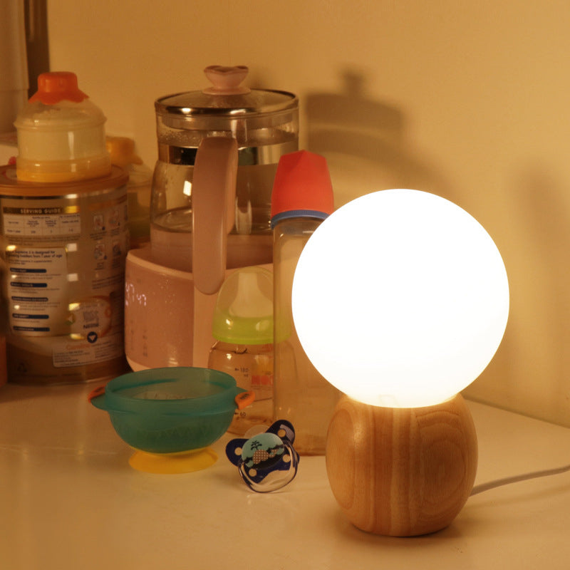 Contemporary Scandinavian Orb Glass Wood Base 1-Light Table Lamp for Bedroom Modern Minimalist Bedroom Lighting Decorative Accent Light Nordic Design Home Décor Stylish Bedside Lamp