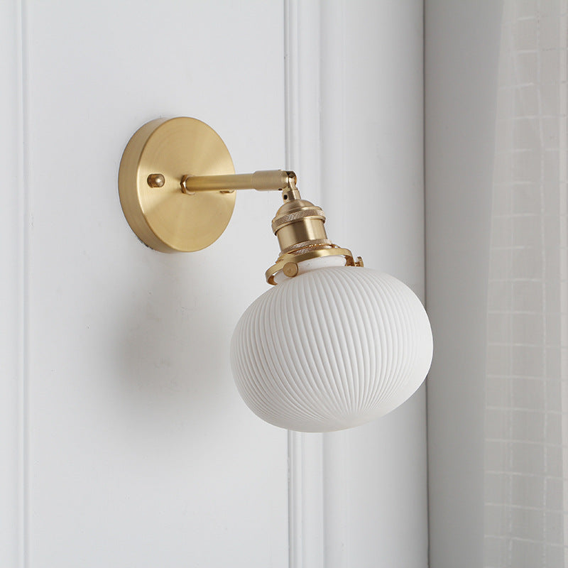 Japanese Retro Minimalist Brass Lucite Wall Sconce Lamp - 1-Light Oval Design