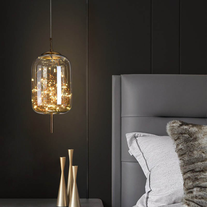 Contemporary Scandinavian Cylinder Oval Glass Pendant Light - 1-Light for Bedroom  

Elevate your bedroom decor with this stylish contemporary Scandinavian cylinder oval glass pendant light. Its sleek design and soft illumination create a cozy atmosphere,