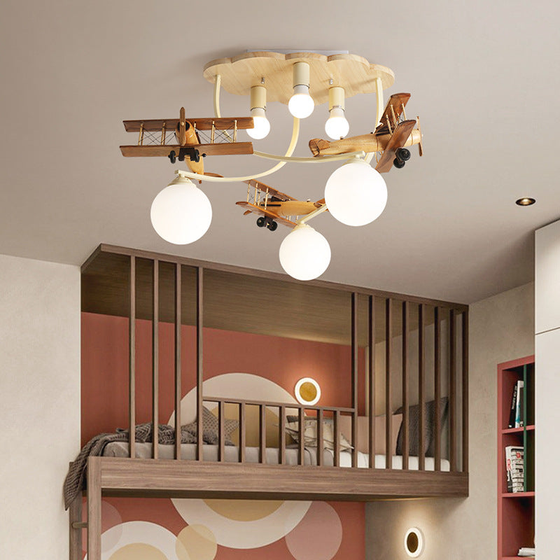 Contemporary Nordic Kids Iron Rubber Wood Glass Plane Cloud Ball 6-Light Flush Mount Ceiling Light for Bedroom, Modern Children's Lighting Fixture, Stylish Nursery Decor, Unique Playroom Illumination, Scandinavian Style Ceiling Lamp, Kid-Friendly Room Lig