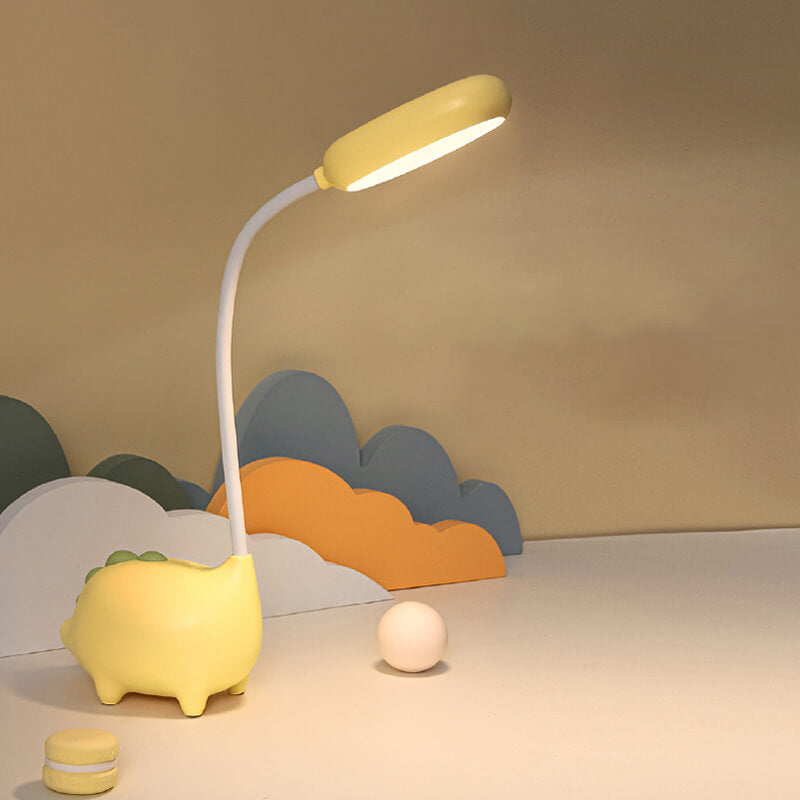 Cartoon Dinosaur Eye Care LED Desk Lamp Rechargeable  
  
Enhance your workspace with this adorable cartoon dinosaur desk lamp. Designed with eye care technology, it provides soft, flicker-free lighting perfect for studying or reading. This rechargeable L