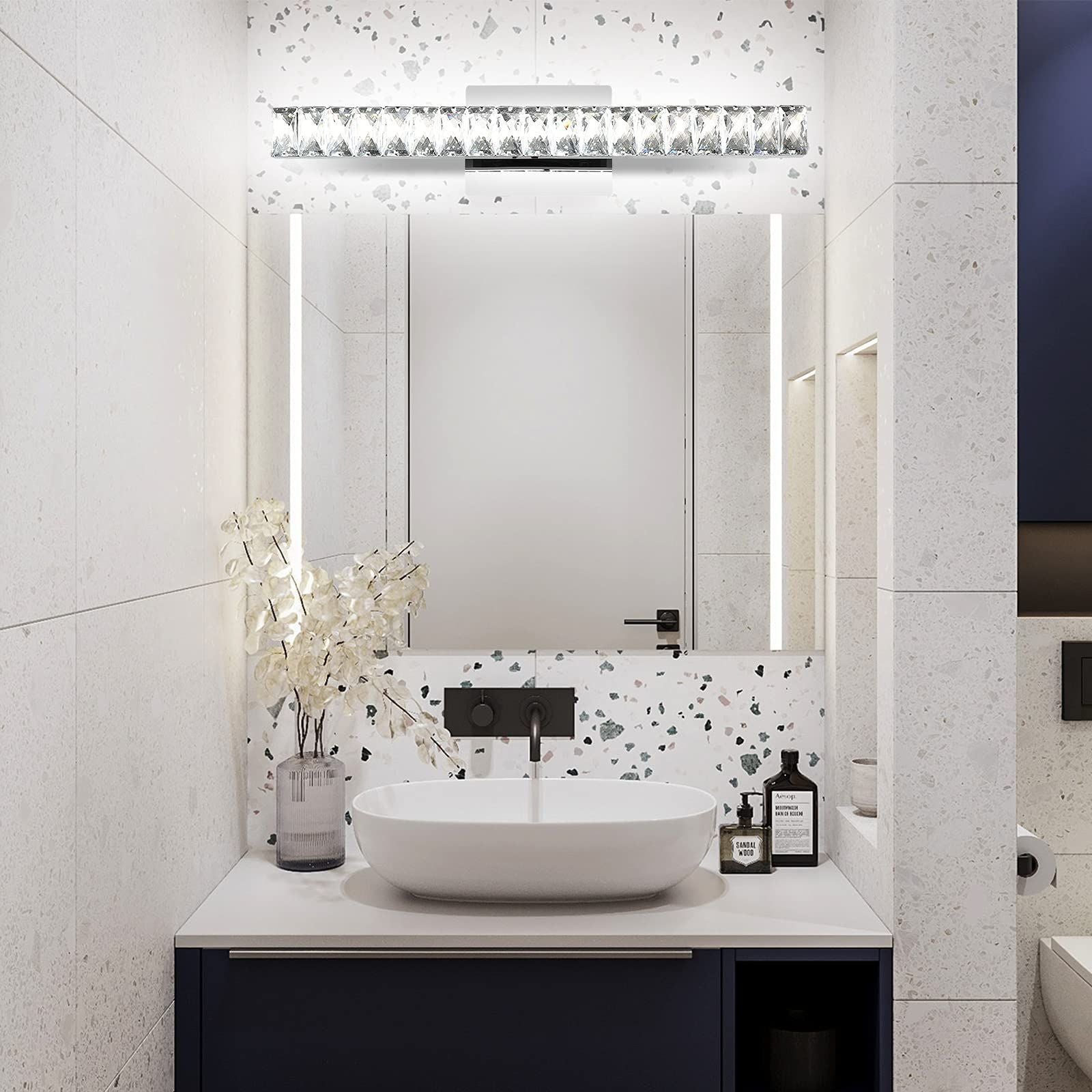 Modern Luxury Stainless Steel Crystal LED Wall Sconce Vanity Light  

Transform your bathroom with this elegant wall sconce featuring a sleek stainless steel design adorned with crystals. The rotatable feature allows for adjustable lighting, enhancing any