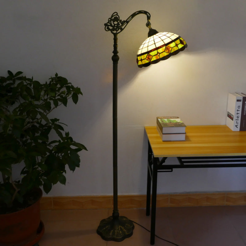 Tiffany Stained Glass Petal Shade Floor Lamp for Home Office  

Illuminate your home office with this stunning Tiffany stained glass petal shade floor lamp. Featuring exquisite craftsmanship and a classic design, this 1-light standing lamp combines beauty