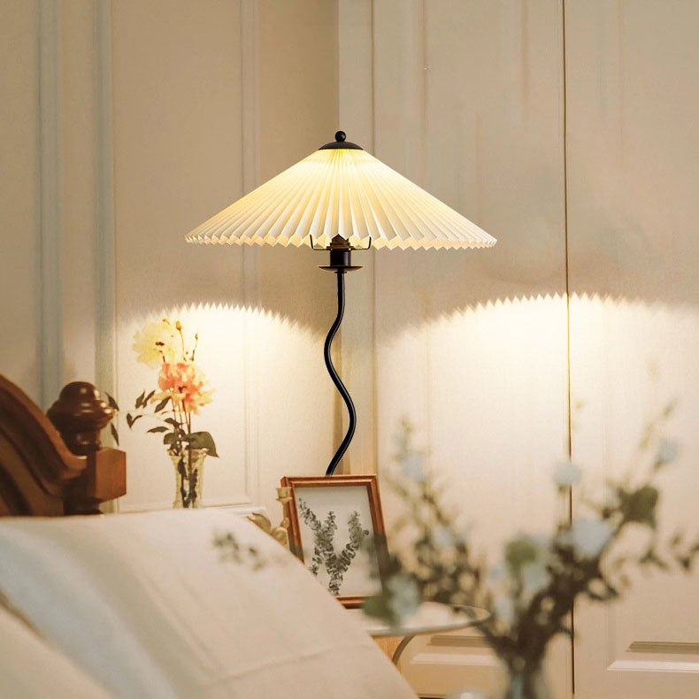 Vintage Fabric Pleated Shade Floor Lamp - 1-Light Standing Light

Illuminate your space with this vintage-inspired standing floor lamp. Featuring a pleated fabric shade, this lamp adds a touch of elegance to any room. Perfect for your living room, bedroom