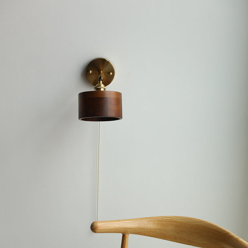 Contemporary Scandinavian Copper Wood 1-Light Wall Sconce for Bedroom  

Illuminate your bedroom with this stylish Scandinavian-inspired wall sconce. The unique round cone design combines warm copper and natural wood for a modern touch. This 1-light fixtu