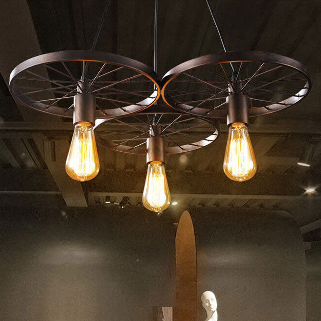 Industrial Wrought Iron Wheels Chandelier - 1/3/6 Light Vintage Lighting Fixture

Elevate your space with this stunning industrial chandelier featuring wrought iron wheels. Perfect for dining rooms, living areas, or entryways, this versatile fixture is av