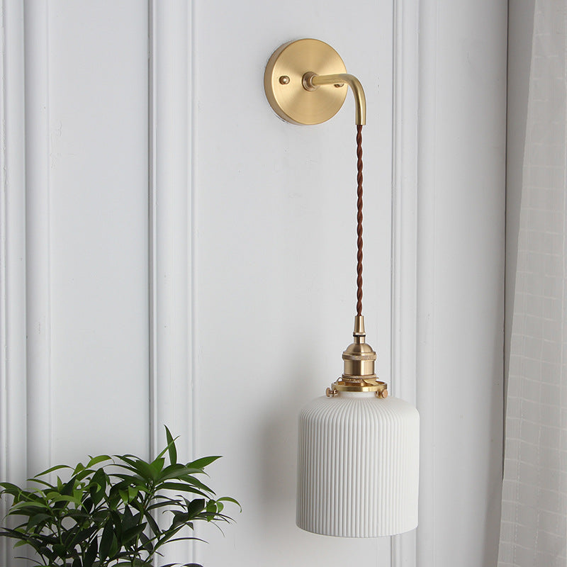 Japanese Retro Minimalist Brass Lucite Wall Sconce Lamp - 1-Light Oval Design