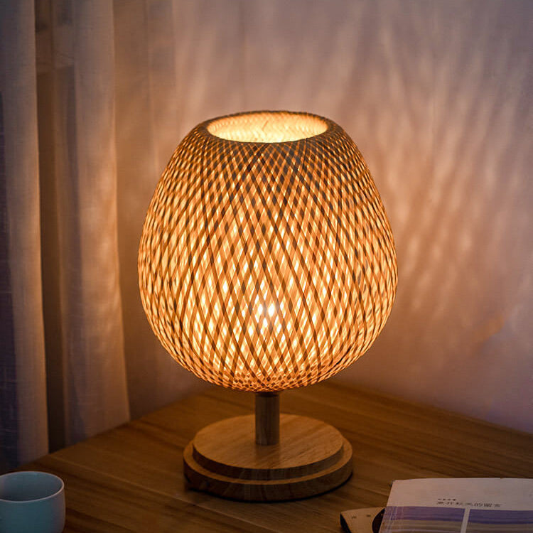 Traditional Chinese Moso Bamboo Iron Weaving Oval Table Lamp - 1-Light for Bedroom