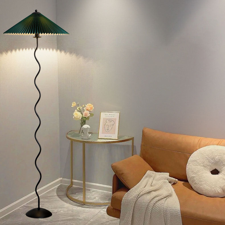Vintage Fabric Pleated Shade Floor Lamp - 1-Light Standing Light

Illuminate your space with this vintage-inspired standing floor lamp. Featuring a pleated fabric shade, this lamp adds a touch of elegance to any room. Perfect for your living room, bedroom