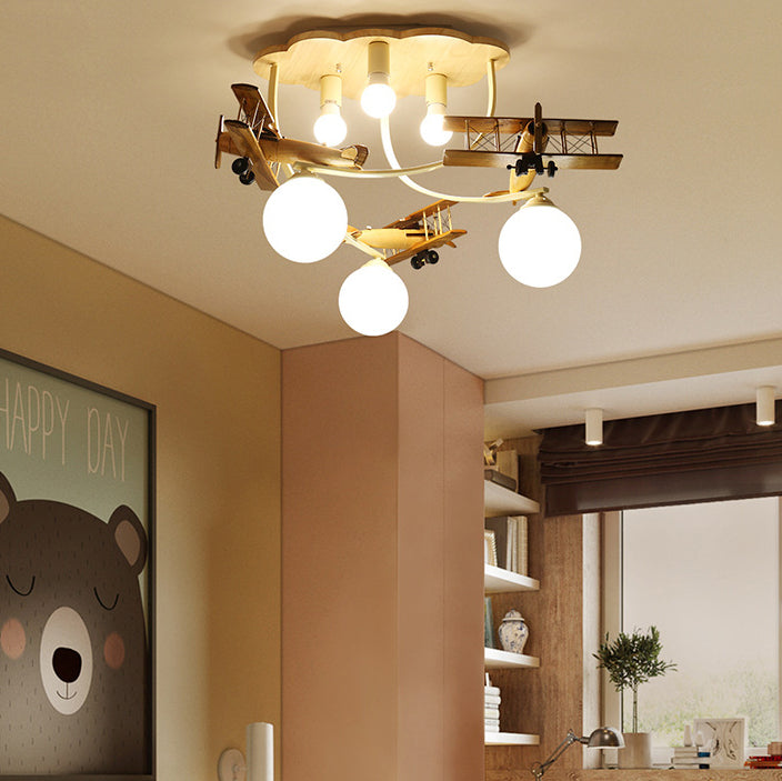 Contemporary Nordic Kids Iron Rubber Wood Glass Plane Cloud Ball 6-Light Flush Mount Ceiling Light for Bedroom, Modern Children's Lighting Fixture, Stylish Nursery Decor, Unique Playroom Illumination, Scandinavian Style Ceiling Lamp, Kid-Friendly Room Lig
