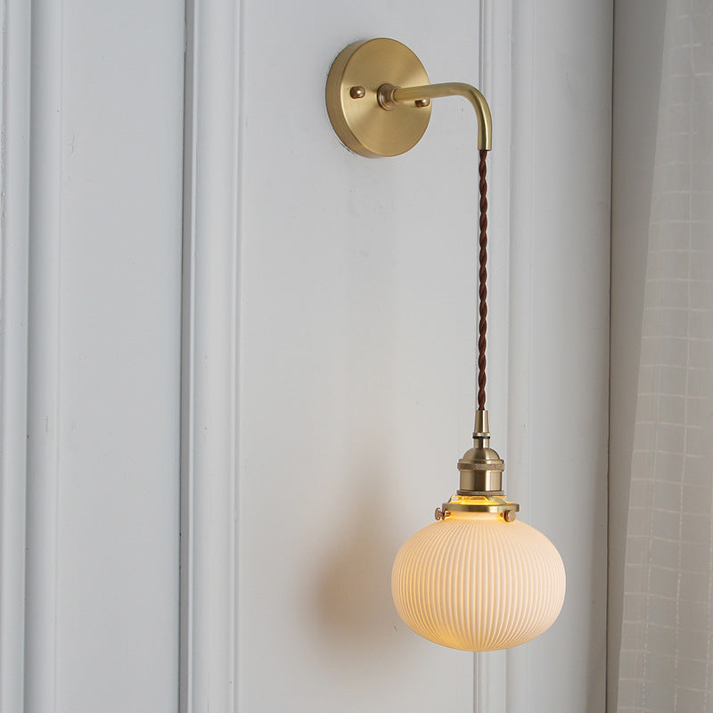 Japanese Retro Minimalist Brass Lucite Wall Sconce Lamp - 1-Light Oval Design