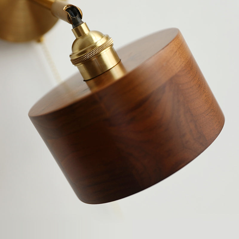 Contemporary Scandinavian Copper Wood 1-Light Wall Sconce for Bedroom  

Illuminate your bedroom with this stylish Scandinavian-inspired wall sconce. The unique round cone design combines warm copper and natural wood for a modern touch. This 1-light fixtu