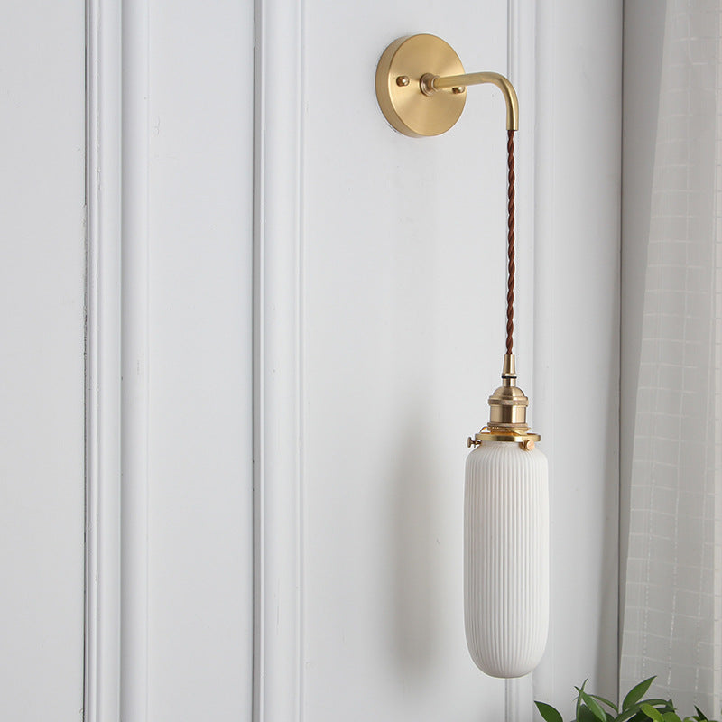 Japanese Retro Minimalist Brass Lucite Wall Sconce Lamp - 1-Light Oval Design
