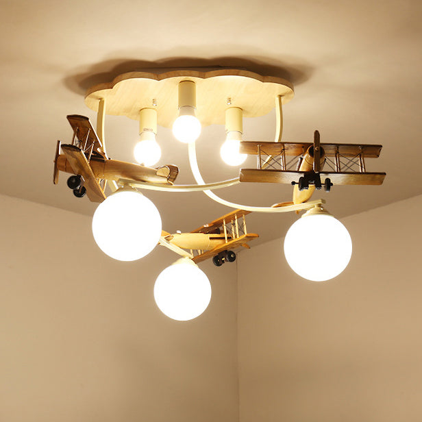 Contemporary Nordic Kids Iron Rubber Wood Glass Plane Cloud Ball 6-Light Flush Mount Ceiling Light for Bedroom, Modern Children's Lighting Fixture, Stylish Nursery Decor, Unique Playroom Illumination, Scandinavian Style Ceiling Lamp, Kid-Friendly Room Lig