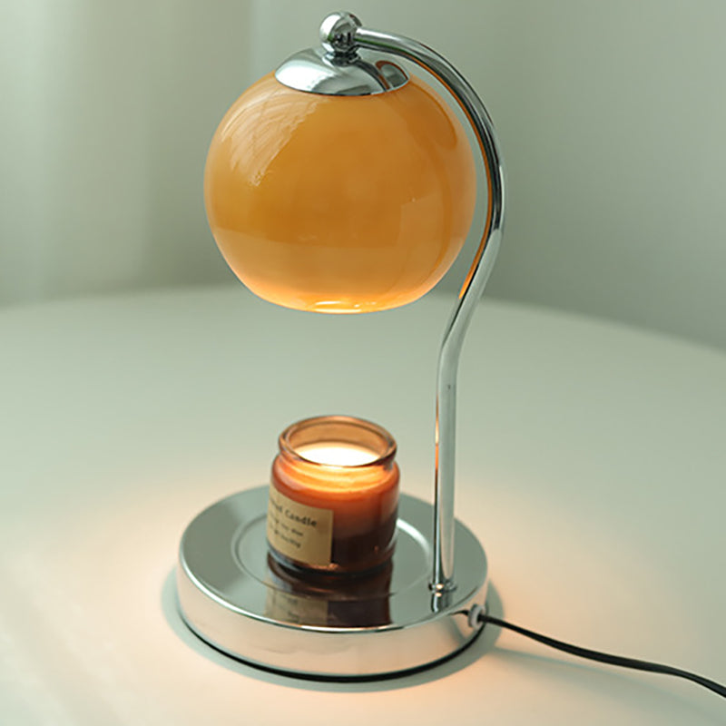 Modern Minimalist Orb Iron Glass Melting Wax Table Lamp - Bedroom Decor 

Illuminate your space with this stylish modern minimalist table lamp, featuring a unique orb design. Crafted from durable iron and elegant glass, the melting wax effect adds a conte