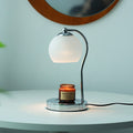 Modern Minimalist Orb Iron Glass Melting Wax Table Lamp - Bedroom Decor 

Illuminate your space with this stylish modern minimalist table lamp, featuring a unique orb design. Crafted from durable iron and elegant glass, the melting wax effect adds a conte