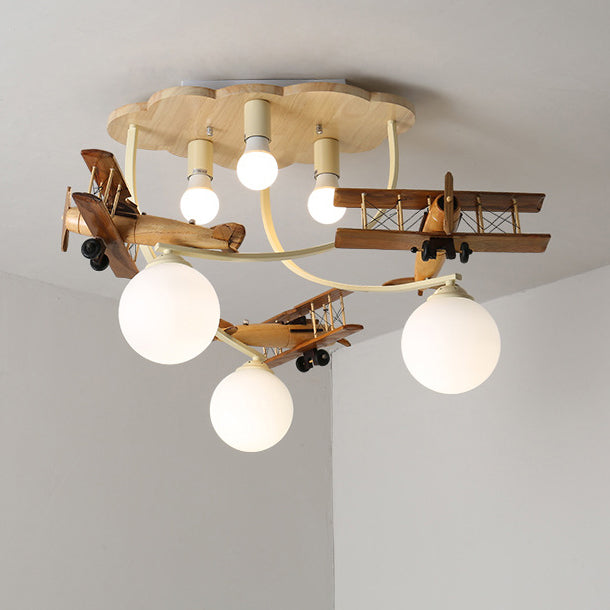 Contemporary Nordic Kids Iron Rubber Wood Glass Plane Cloud Ball 6-Light Flush Mount Ceiling Light for Bedroom, Modern Children's Lighting Fixture, Stylish Nursery Decor, Unique Playroom Illumination, Scandinavian Style Ceiling Lamp, Kid-Friendly Room Lig