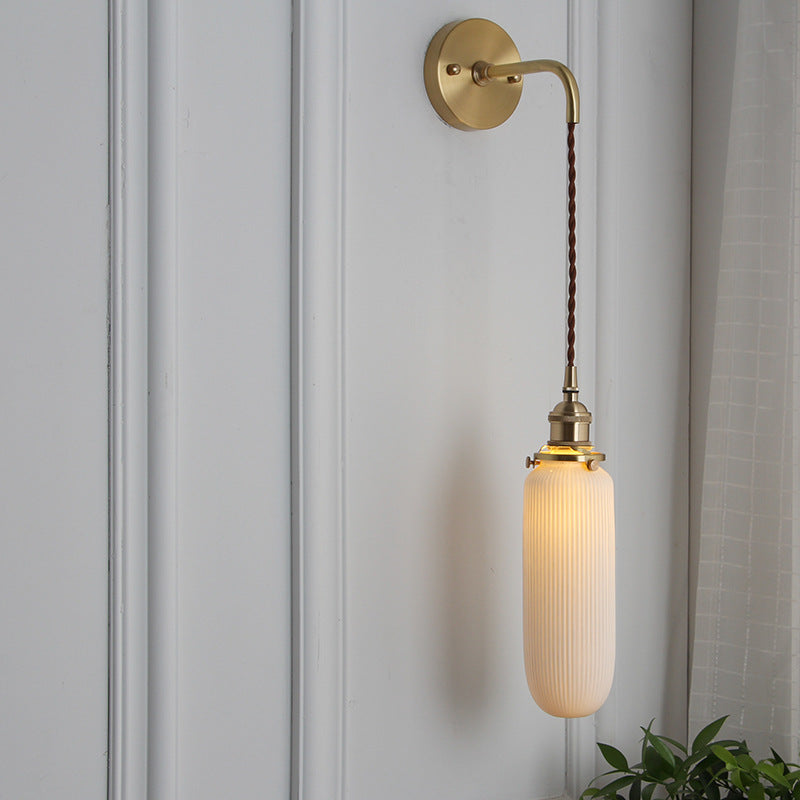 Japanese Retro Minimalist Brass Lucite Wall Sconce Lamp - 1-Light Oval Design