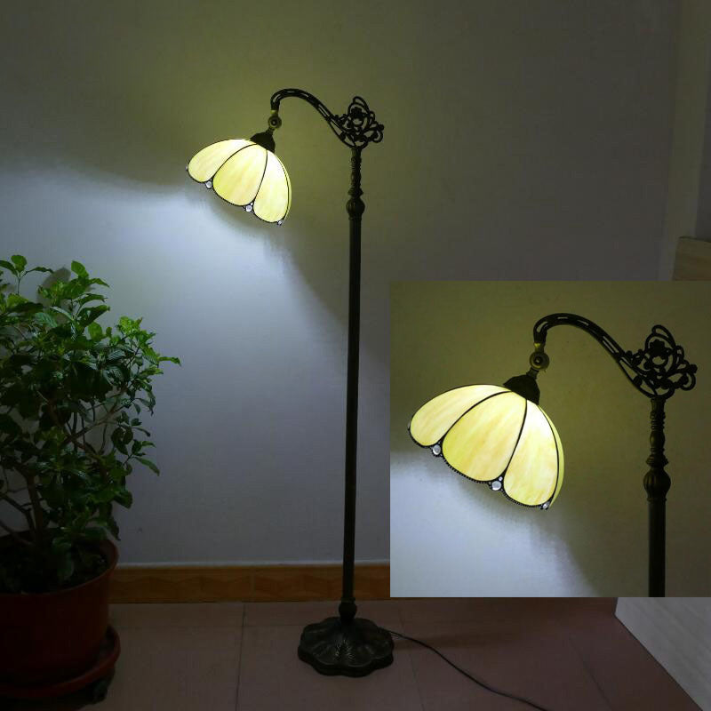 Tiffany Stained Glass Petal Shade Floor Lamp for Home Office  

Illuminate your home office with this stunning Tiffany stained glass petal shade floor lamp. Featuring exquisite craftsmanship and a classic design, this 1-light standing lamp combines beauty