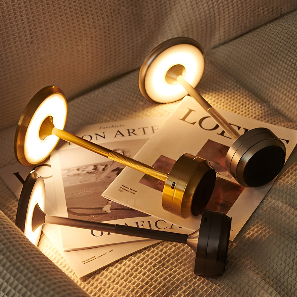 Title: Sleek Metal UFO Alien Table Lamp - Cordless & Modern

Description: Illuminate your space with our Slender Cordless UFO Alien Table Lamp. Featuring a stylish plated metal design, this futuristic lamp is perfect for adding a unique touch to any room.