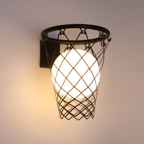 Modern Art Deco Kids Basketball Hoop Wall Sconce - 1-Light Glass Lamp  

Illuminate your child’s bedroom with this stylish Modern Art Deco kids basketball hoop wall sconce. Featuring a sleek glass design and a playful basketball motif, this 1-light lamp a