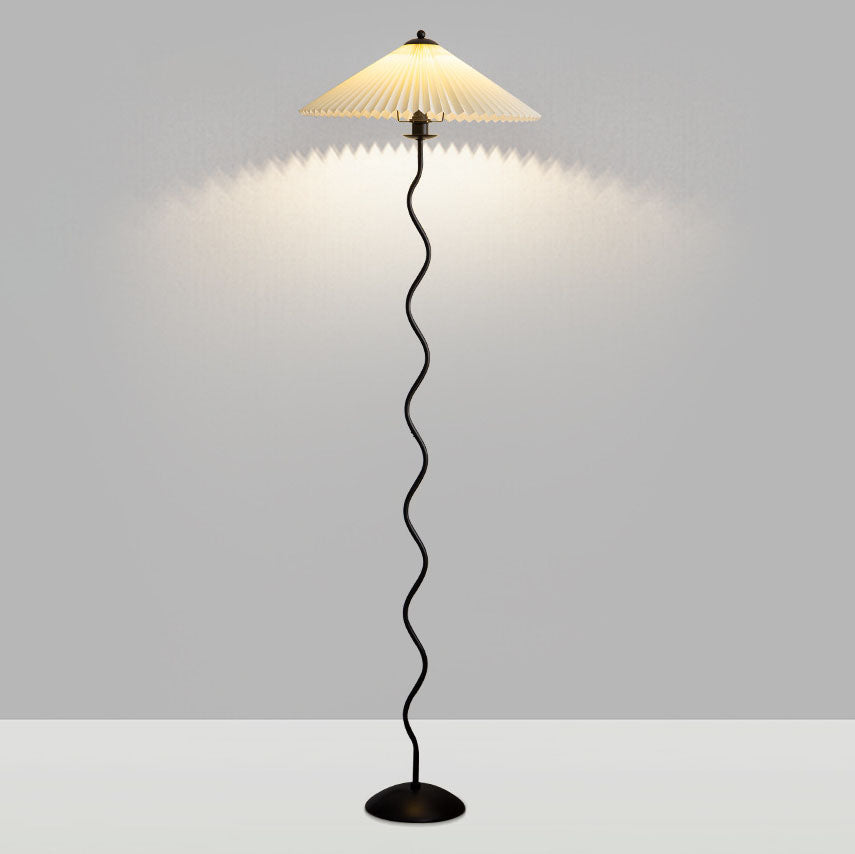 Vintage Fabric Pleated Shade Floor Lamp - 1-Light Standing Light

Illuminate your space with this vintage-inspired standing floor lamp. Featuring a pleated fabric shade, this lamp adds a touch of elegance to any room. Perfect for your living room, bedroom