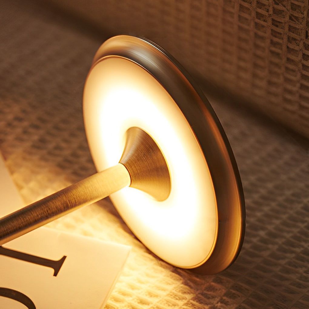 Title: Sleek Metal UFO Alien Table Lamp - Cordless & Modern

Description: Illuminate your space with our Slender Cordless UFO Alien Table Lamp. Featuring a stylish plated metal design, this futuristic lamp is perfect for adding a unique touch to any room.