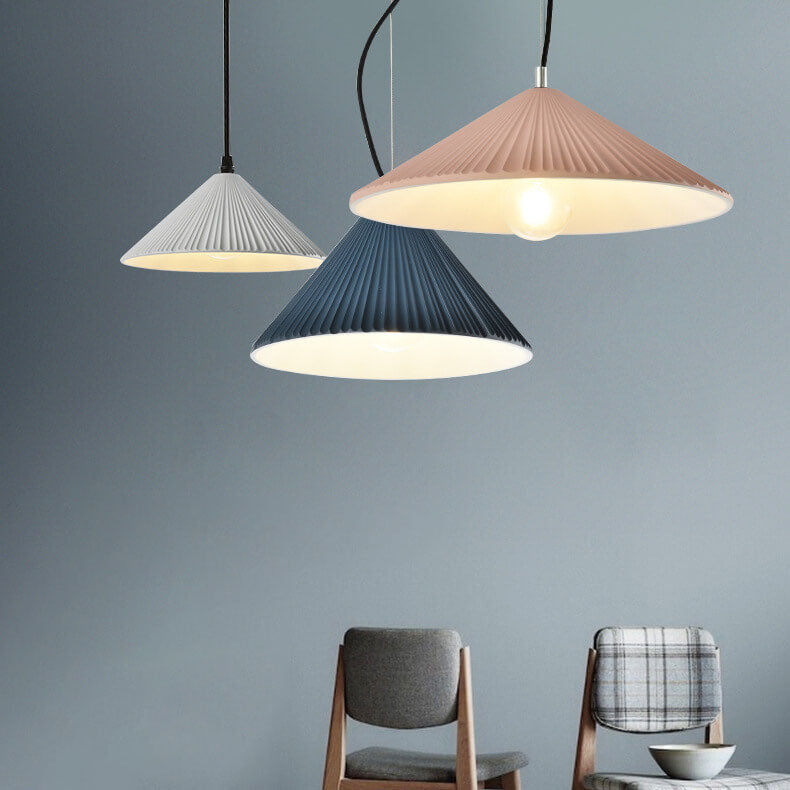 Nordic Resin Pendant Light - Textured Umbrella Design 

Illuminate your space with our Nordic Resin 1-Light Pendant Light featuring a unique textured umbrella design. Perfect for modern interiors, this stylish lighting fixture adds a touch of Scandinavian
