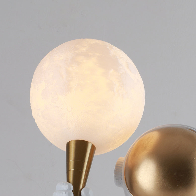 Contemporary Astronaut Resin Table Lamp - 1-Light ABS Design for Bedroom 

Illuminate your space with this unique contemporary astronaut table lamp. Crafted from high-quality resin and ABS materials, it features a striking design that adds a playful yet m