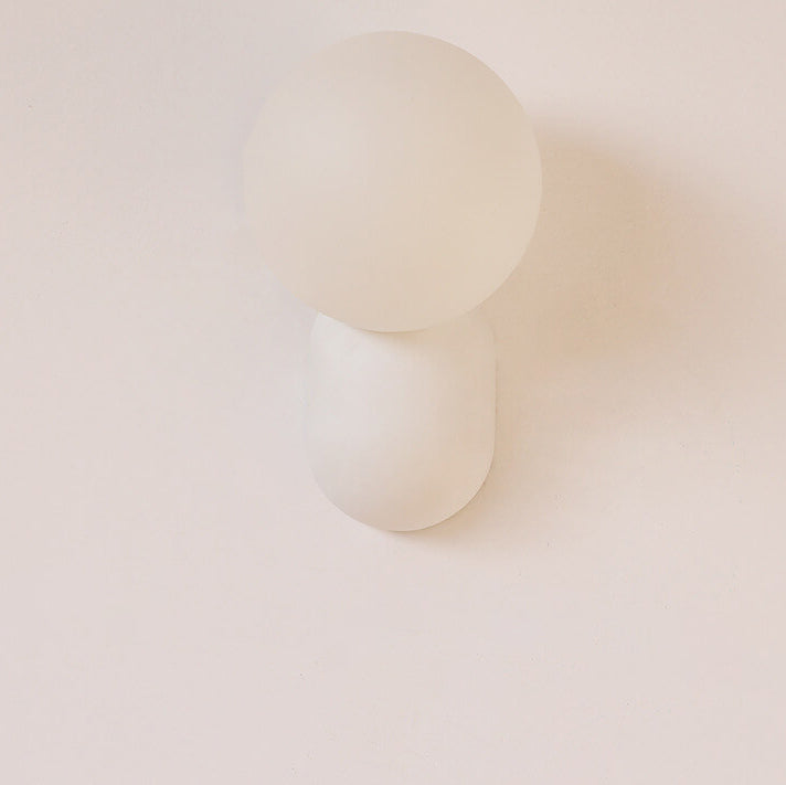 Macaron Cream Resin Glass Ball 1-Light Wall Sconce Lamp 

Illuminate your space with this stylish macaron cream wall sconce featuring a delightful resin glass ball design. Perfect for modern interiors, this 1-light lamp adds a touch of elegance to living
