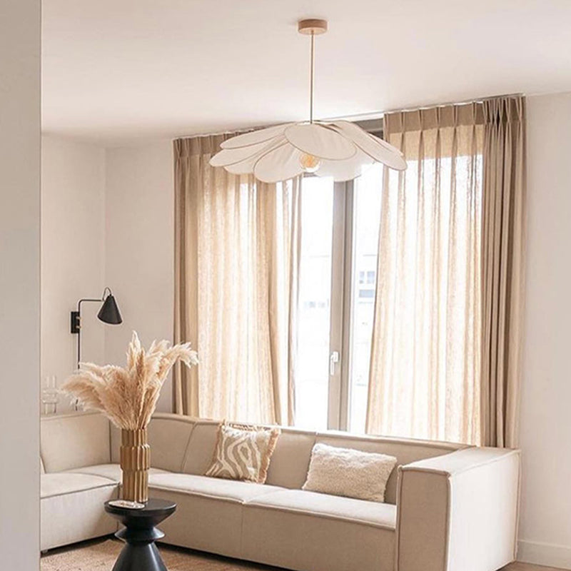 Contemporary Boho Metal Petal Pendant Light for Living Room  

Illuminate your living space with our Contemporary Boho Petal Fabric Metal Lampshade Pendant Light. This stylish 1-light fixture is perfect for adding a touch of bohemian flair to your decor.