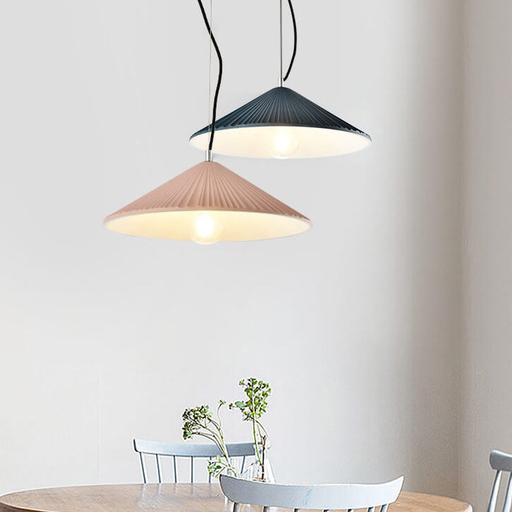 Nordic Resin Pendant Light - Textured Umbrella Design 

Illuminate your space with our Nordic Resin 1-Light Pendant Light featuring a unique textured umbrella design. Perfect for modern interiors, this stylish lighting fixture adds a touch of Scandinavian