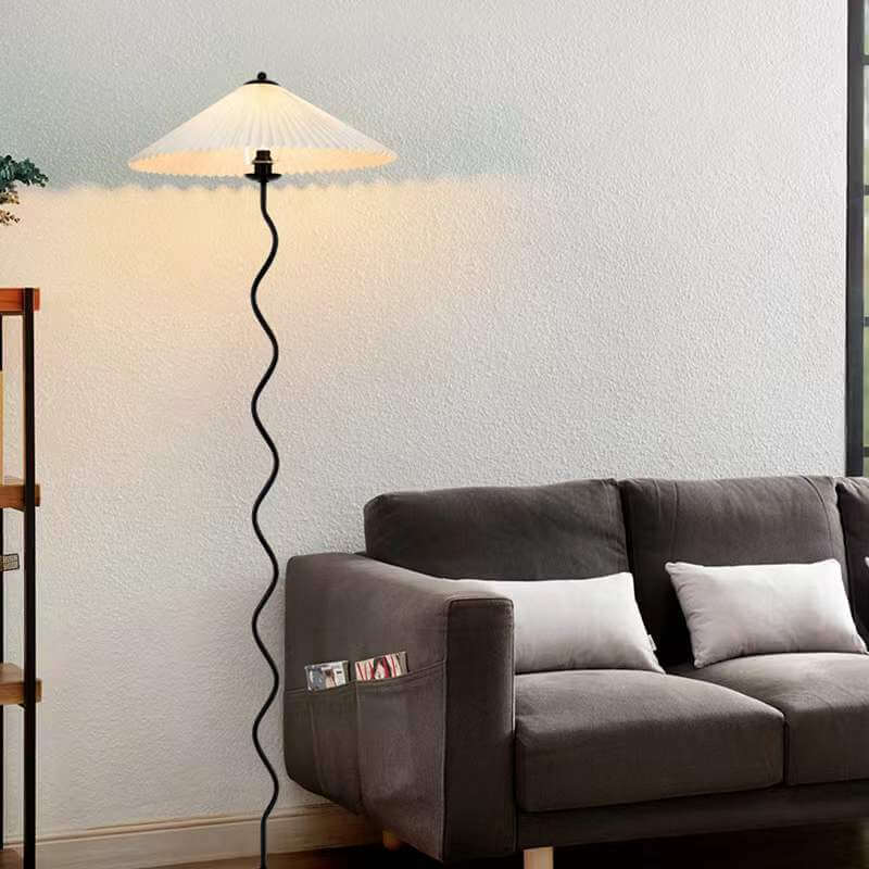 Vintage Fabric Pleated Shade Floor Lamp - 1-Light Standing Light

Illuminate your space with this vintage-inspired standing floor lamp. Featuring a pleated fabric shade, this lamp adds a touch of elegance to any room. Perfect for your living room, bedroom