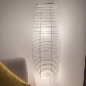 Nordic Minimalist Rice Paper Floor Lamp - 2-Light Column Design  

Illuminate your space with our Nordic Minimalist Rice Paper Column 2-Light Standing Floor Lamp. Featuring a sleek design, this lamp brings a touch of elegance and tranquility to any room.