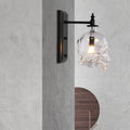 Contemporary Skull Glass Iron Wall Sconce - 1-Light Halloween Lamp for Living Room