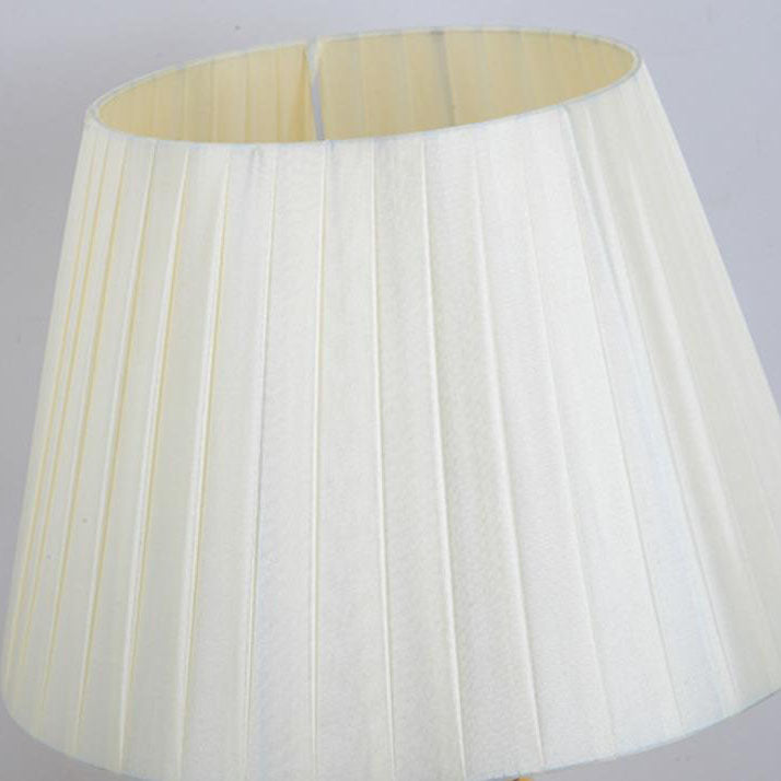 Modern Creative Warm Ceramic Cylindrical 1-Light Table Lamp | Stylish Home Lighting | Contemporary Desk Lamp | Unique Ceramic Design | Warm White Light | Minimalist Table Lamp | Bedroom Nightstand Lamp | Living Room Decor | Elegant Lighting Solution | Art