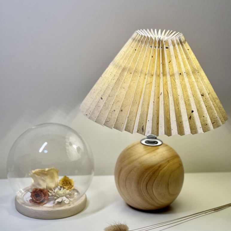 Modern Minimalist Round Fabric Pleated Ceramic 1-Light Table Lamp for Bedroom | Stylish Bedside Lighting | Contemporary Home Decor | Elegant Bedroom Accent | Soft Ambient Illumination | Decorative Lighting Fixture | Chic Fabric Shade | Ceramic Base Design